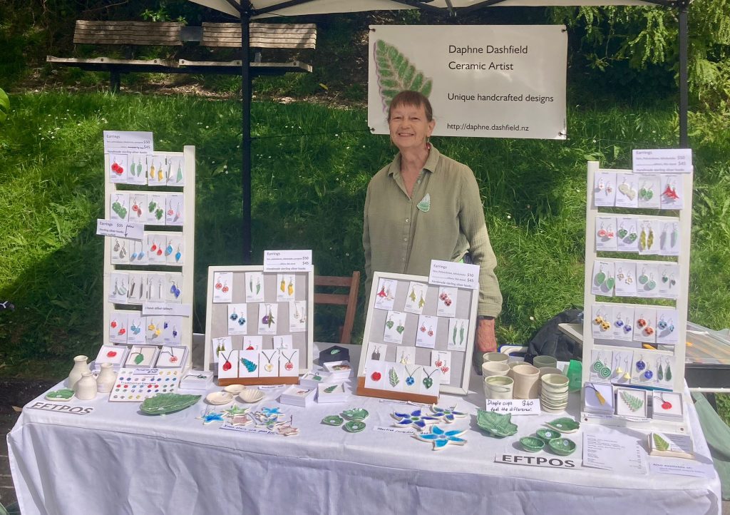 Daphne behind stall of porcelain jewellery and other ceramics